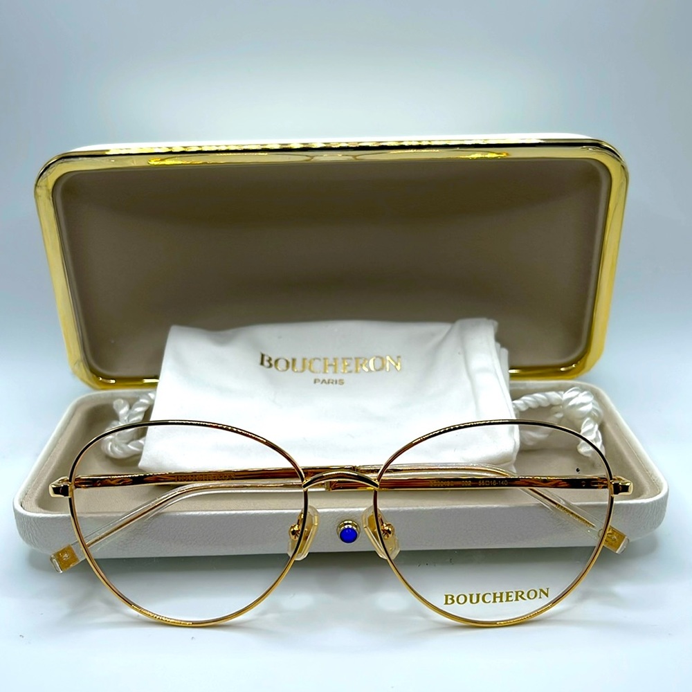 NWOT. Boucheron Optical frames. Oval lenses with gold frame.